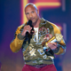 Image for article titled Netflix picks up huge tab for action movie starring Dwayne Johnson, Gal Gadot, and Ryan Reynolds